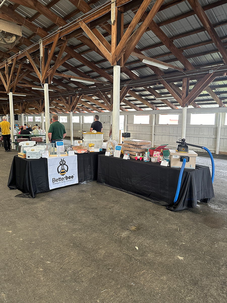 Table full of raffle items at Betterbee's field day