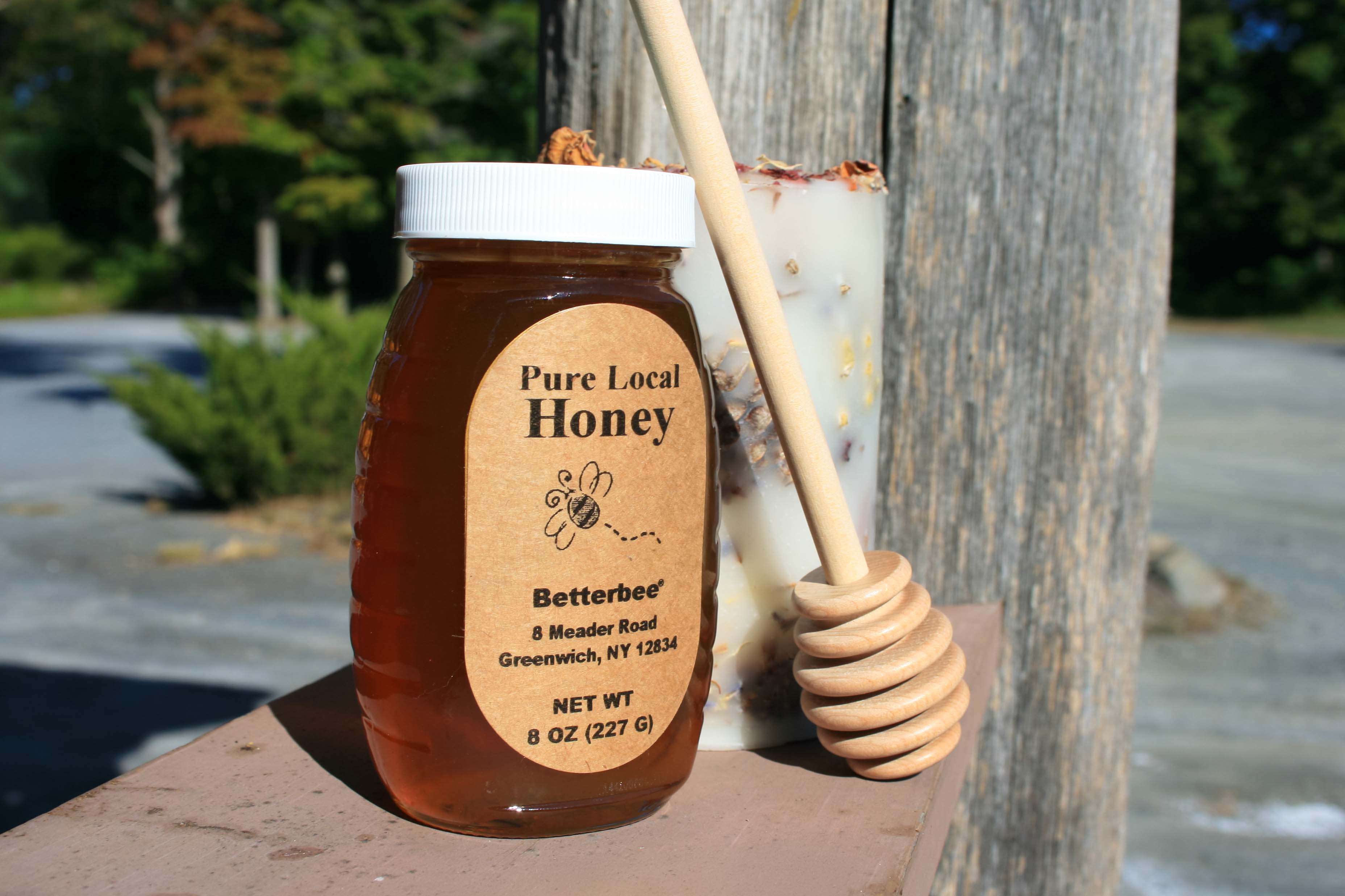 kraft Label on a honey Jar with honey dipper by it